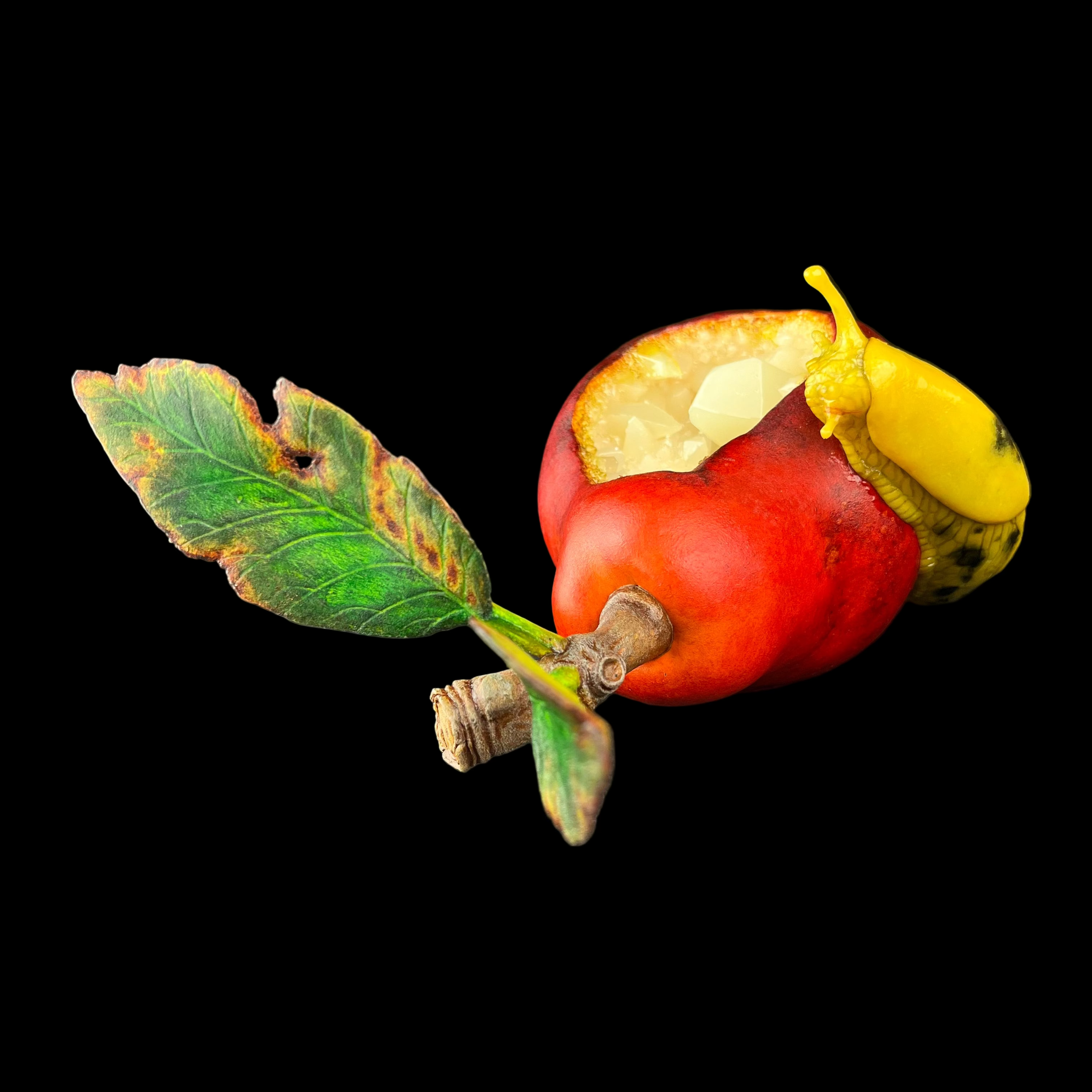 Red pear with a yellow slug on a dark surface