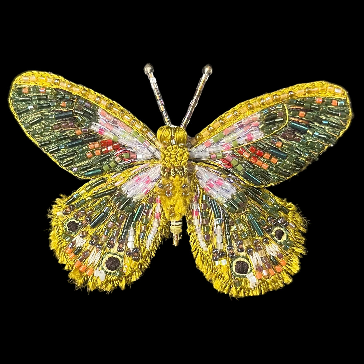Lime yellow thread embroidered moth shape with glass beaded accents and lifelike detail