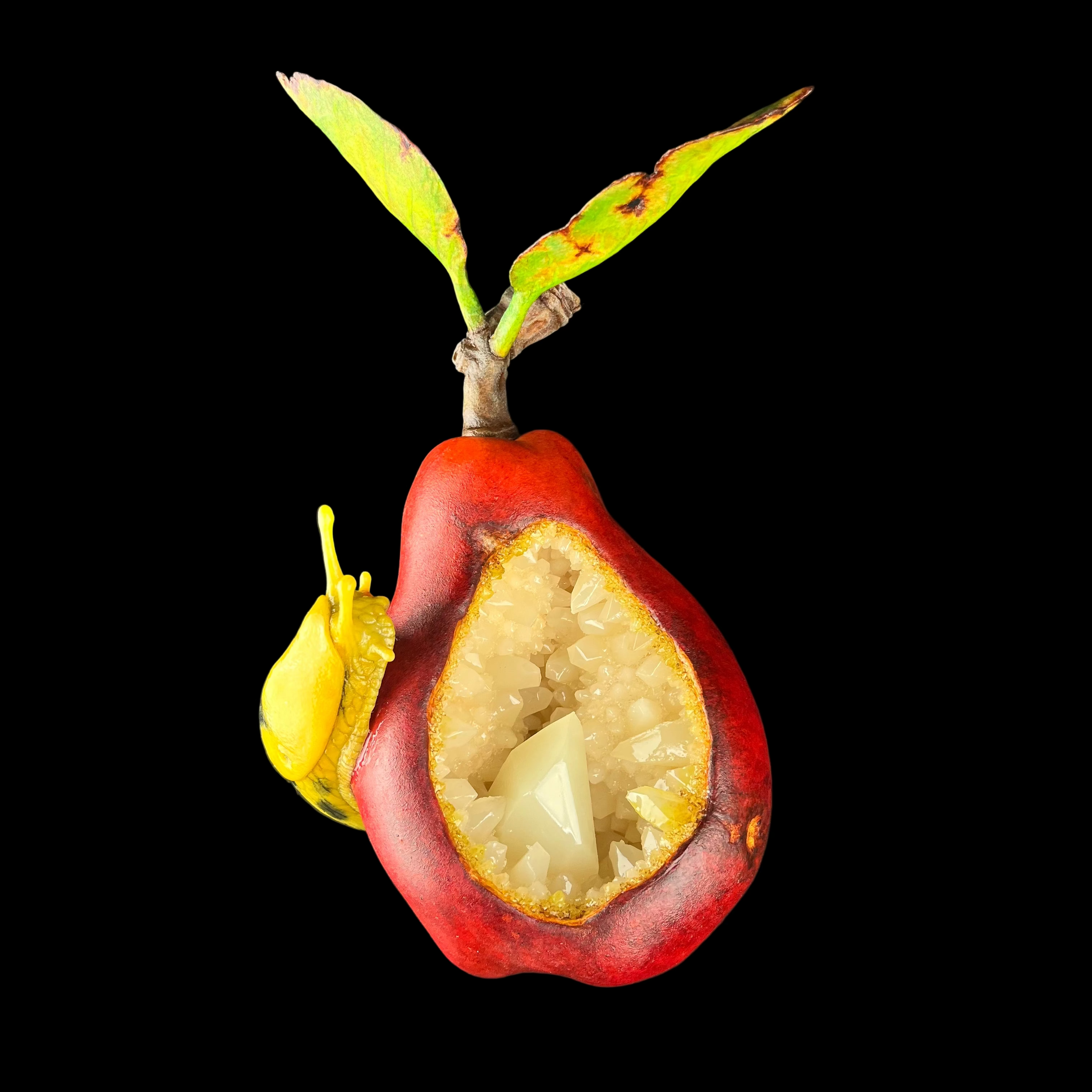 Half-cut red fruit with a yellow interior on a dark background