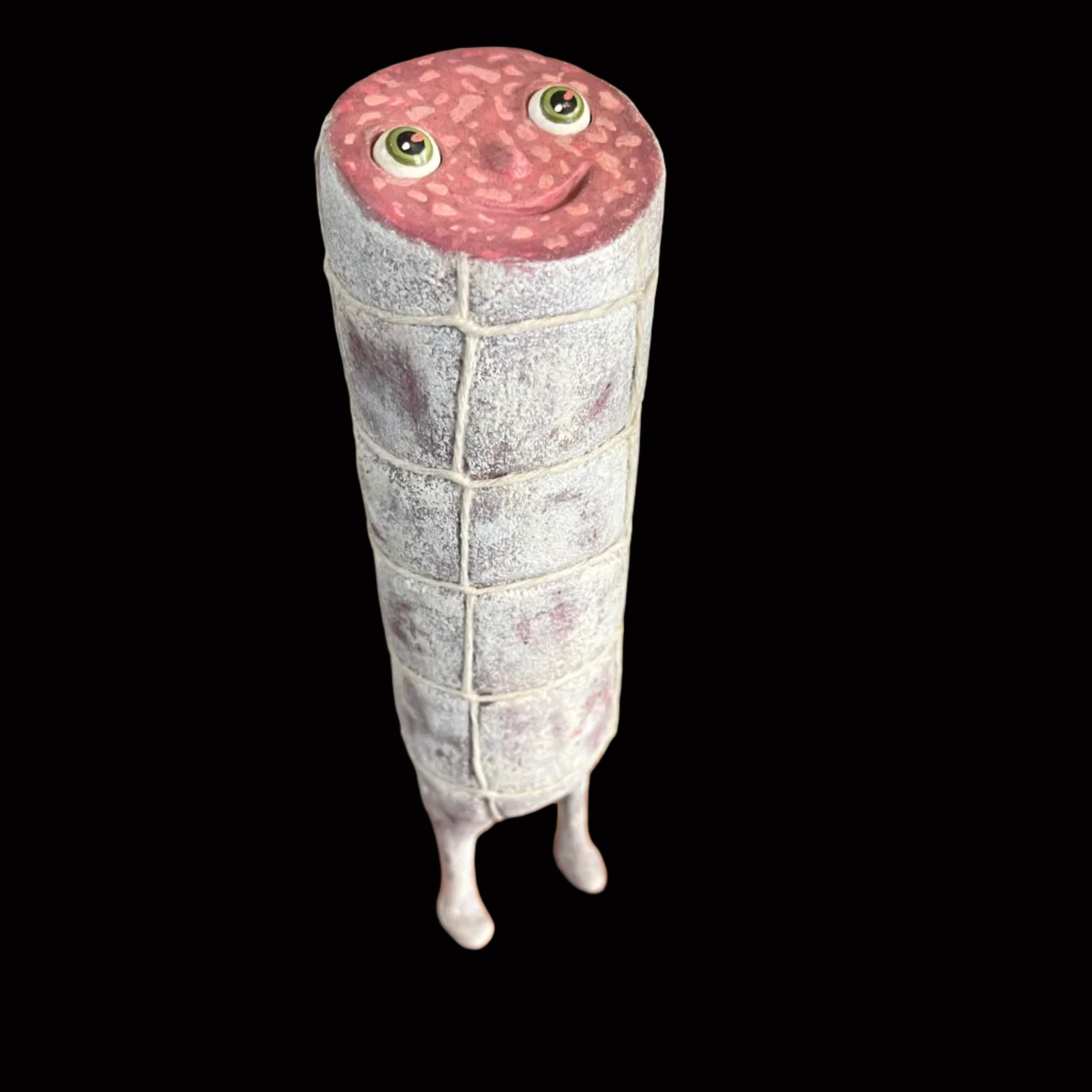 Smiling salami with eyes and feet