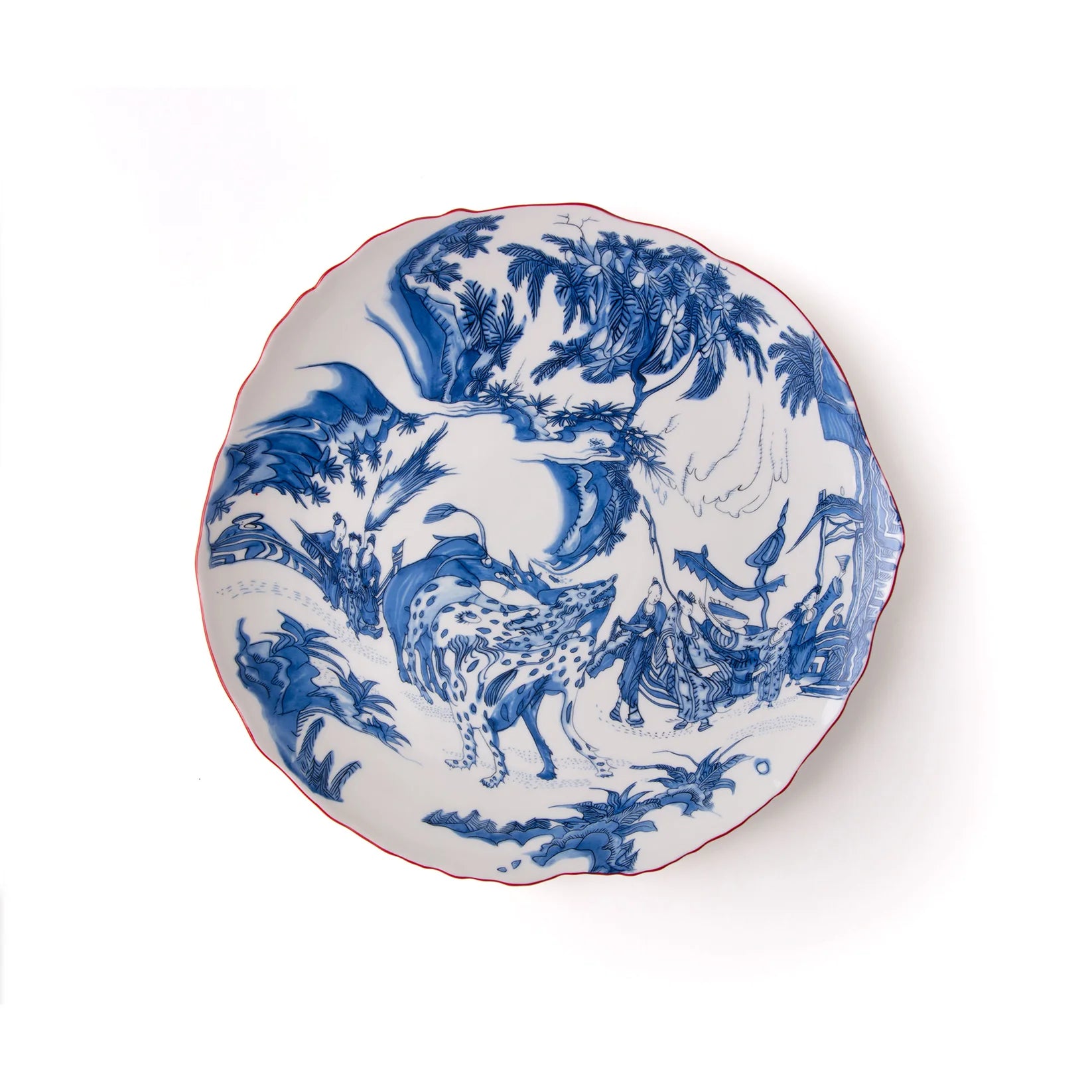 Decorative plate with blue and white rooster design on a white background