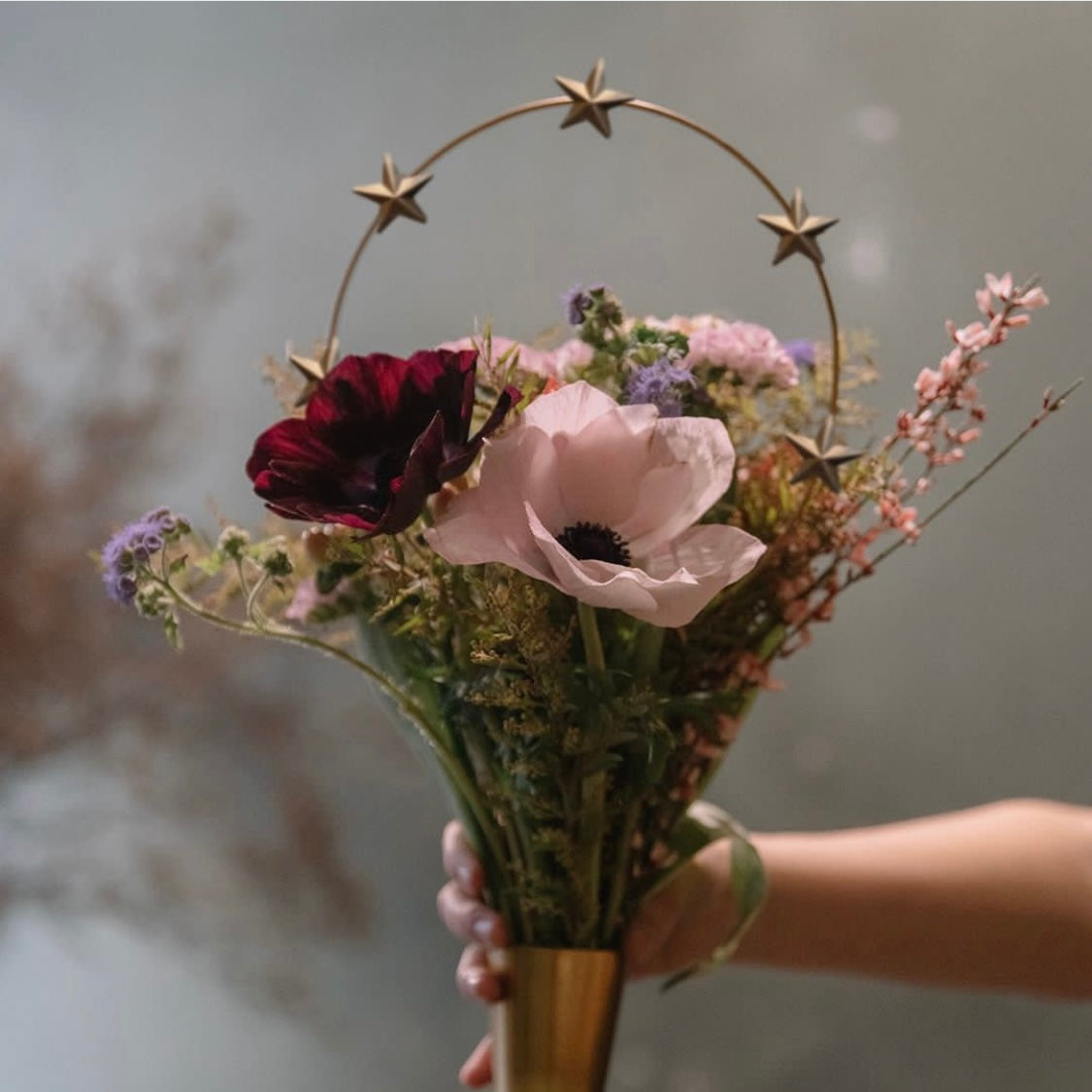 Star Halo shown used in flower arrangement as ornamentation 