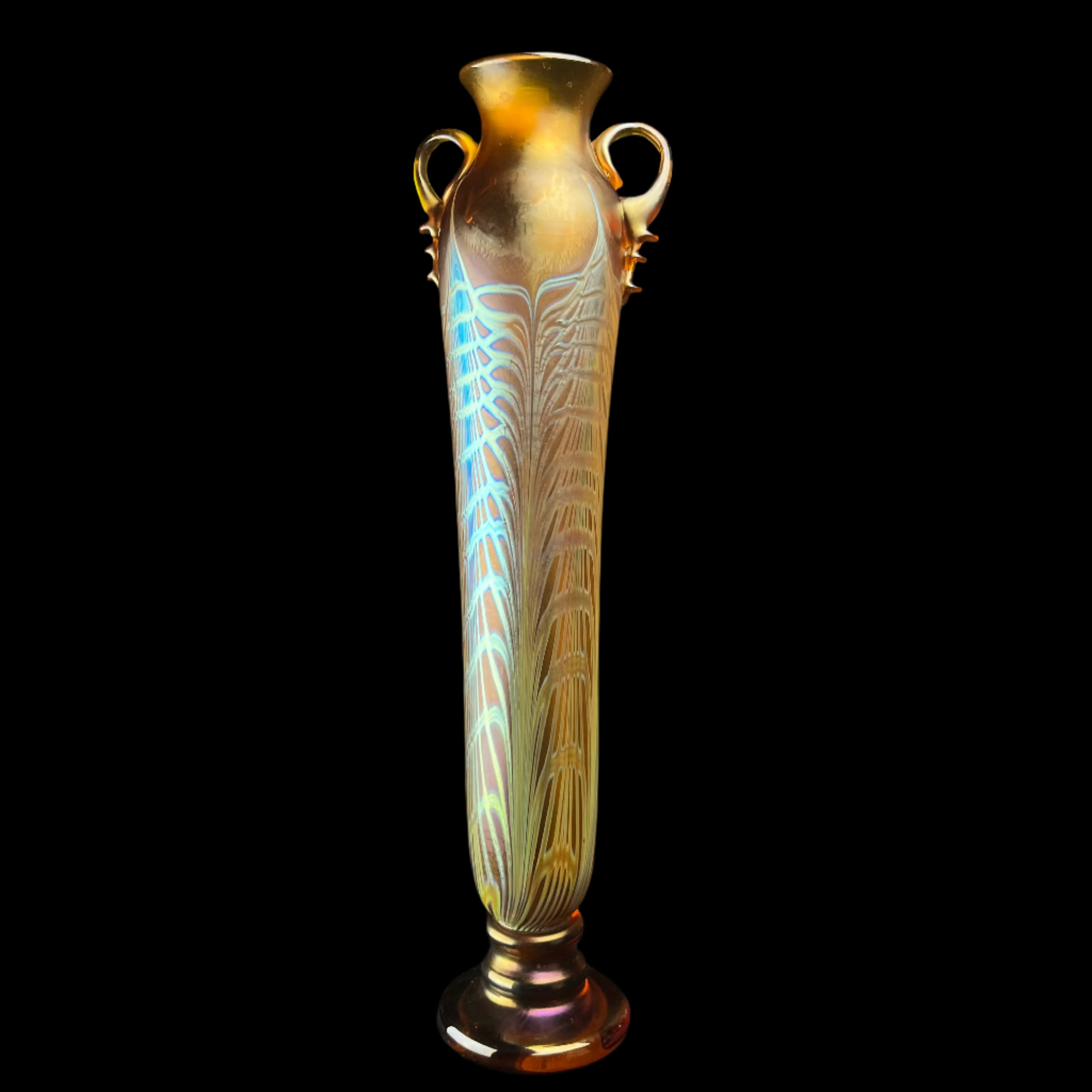 Decorative vase with intricate design on a dark surface