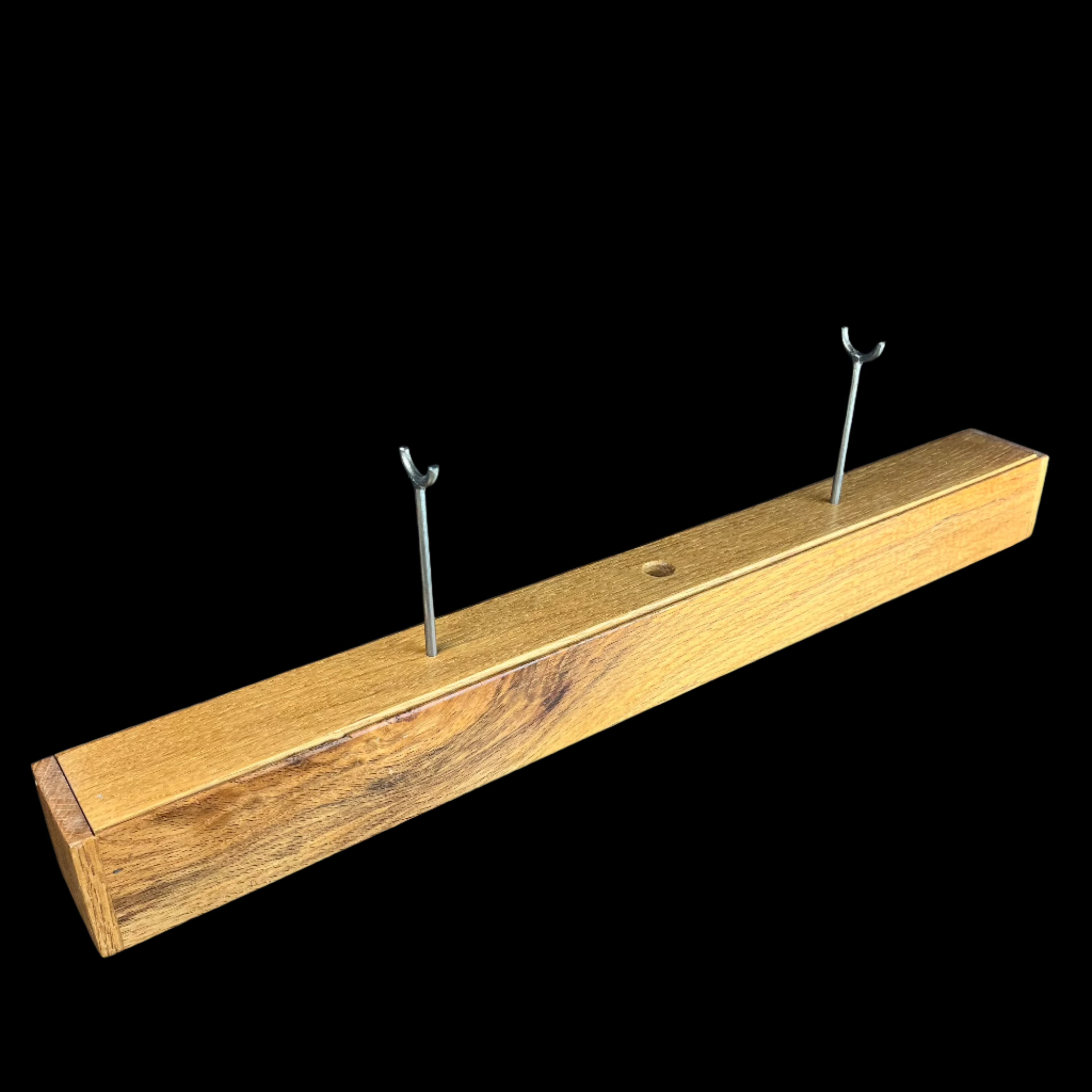 metal brackets installed on wood box base 