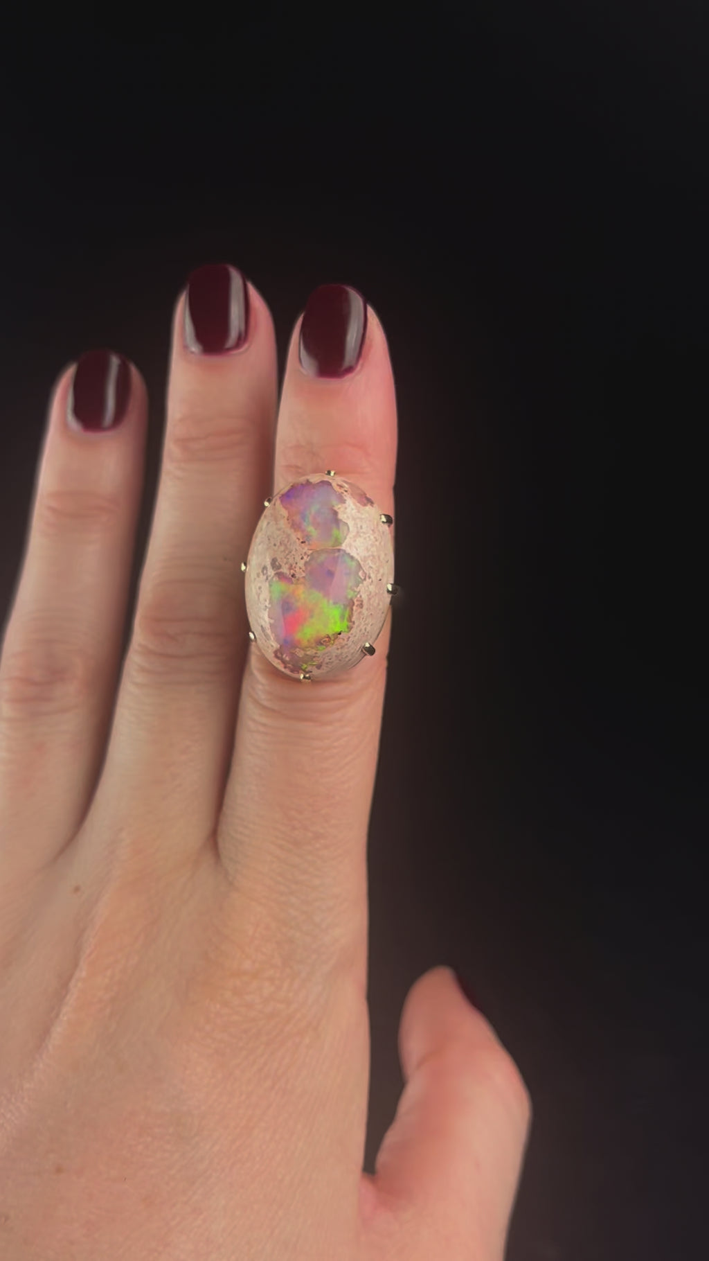 Fire Opal Ring in motion with colors