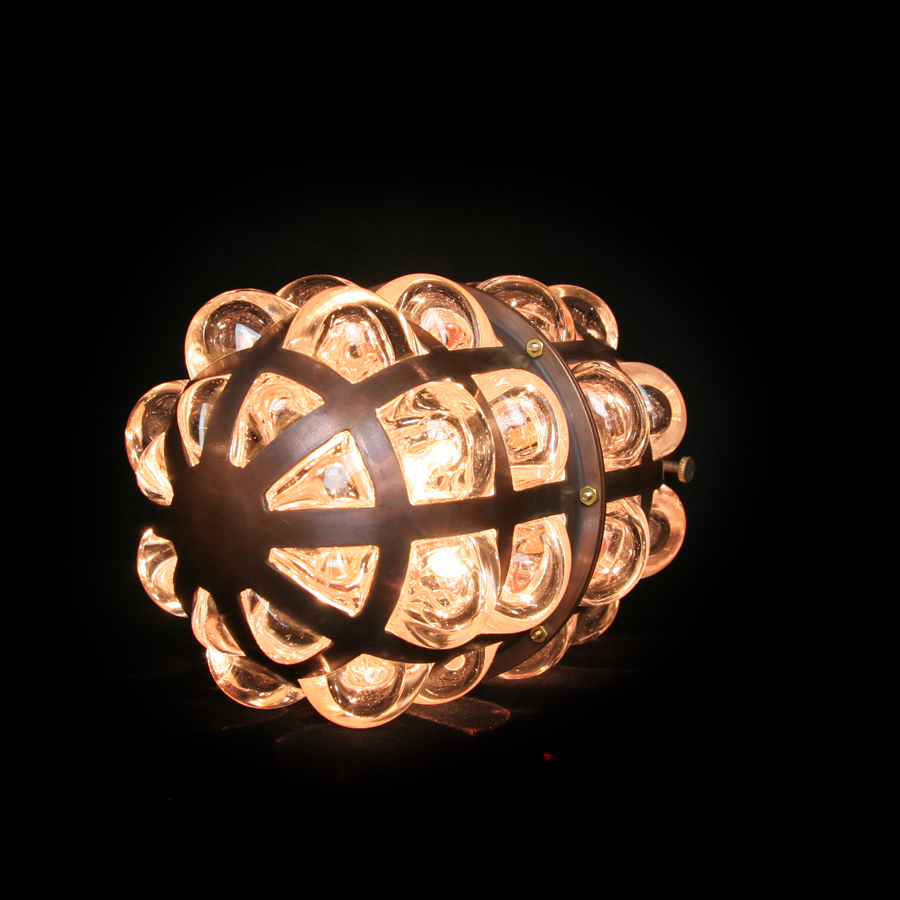 Bottom view of Dandelion Pill Pendant Lamp illuminated