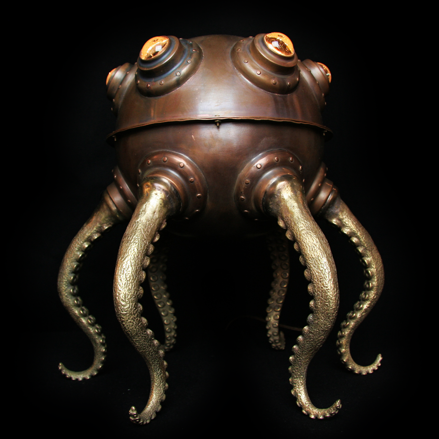 Front view of Father Octopod Desk Lamp with light on | Art Object by Evan Chambers