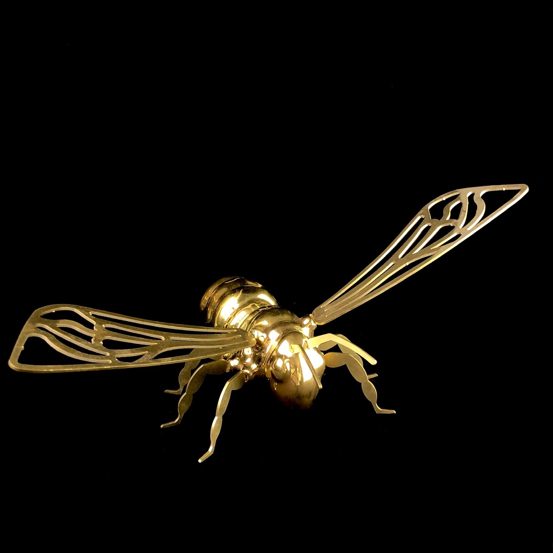 Front view of Gold Wall Hanging Bee