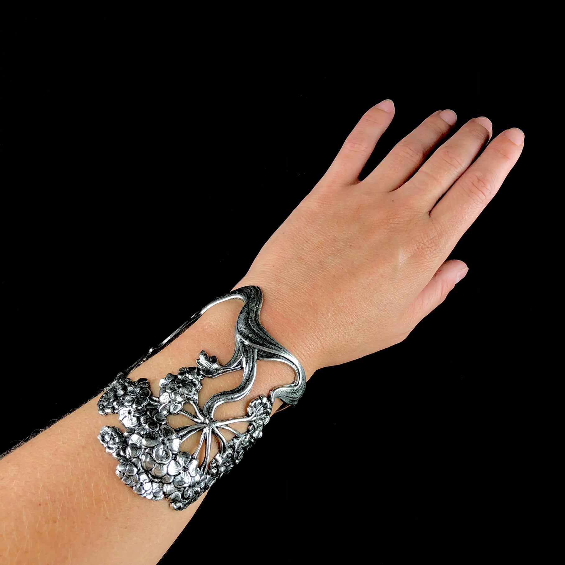 Silver Wisteria Cuff shown on wrist