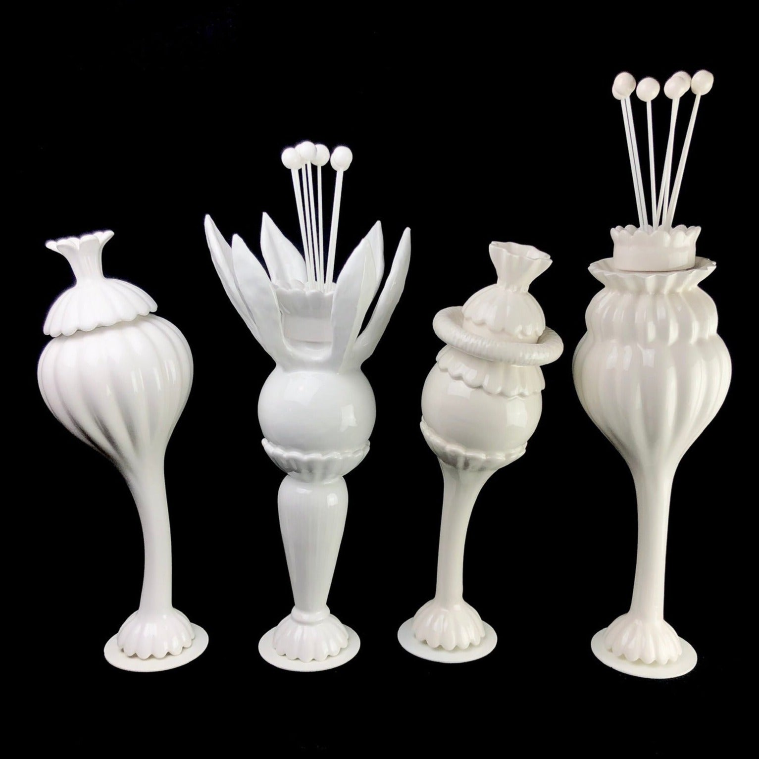 Four different designs of Ceramic Flower Oil Diffuser available for purchase