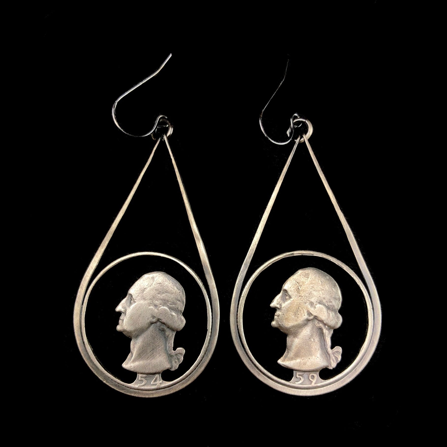 Front view of Quarter Coin Earrings showing 54 and 59, the years they were minted