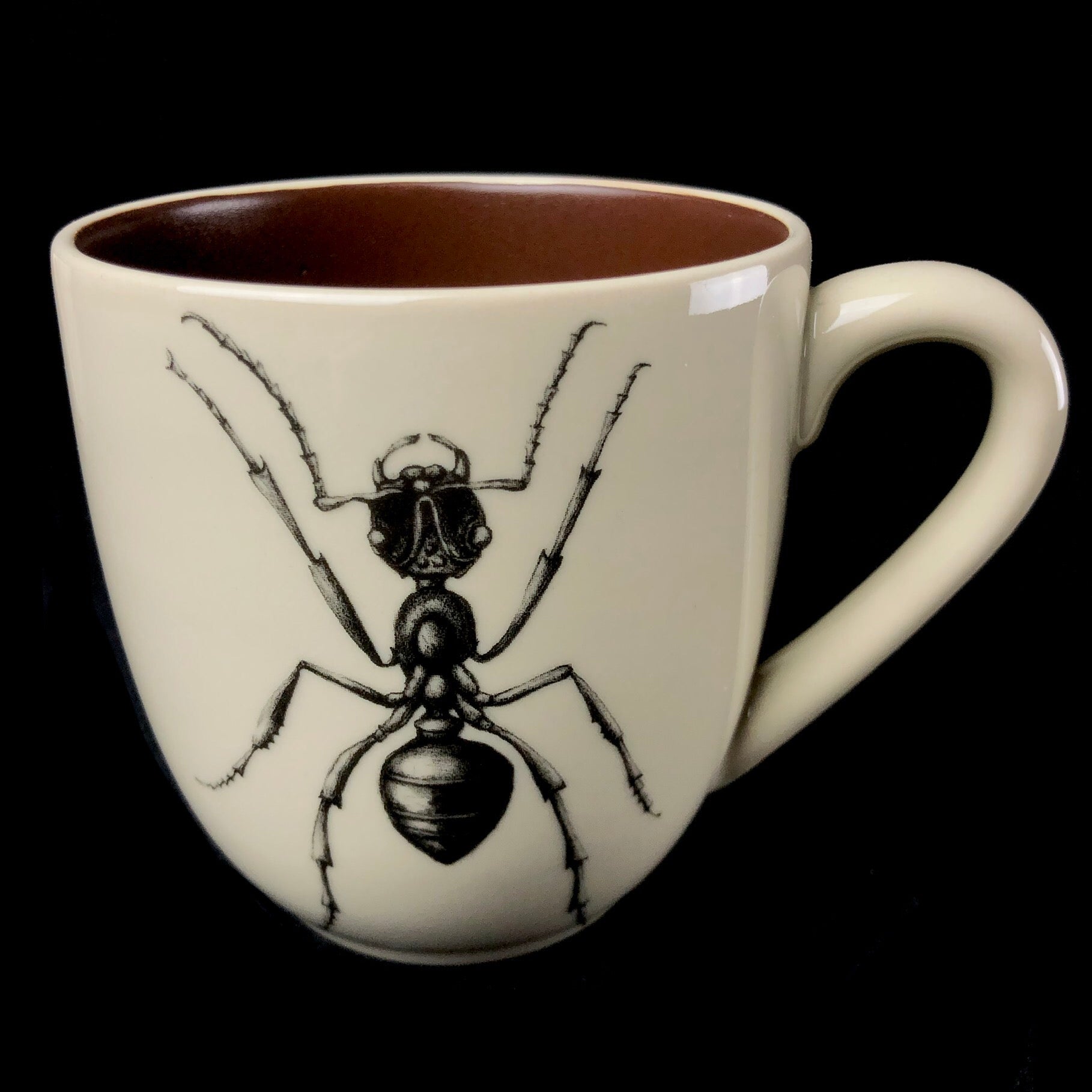 Front view of Ant Mug with brown interior