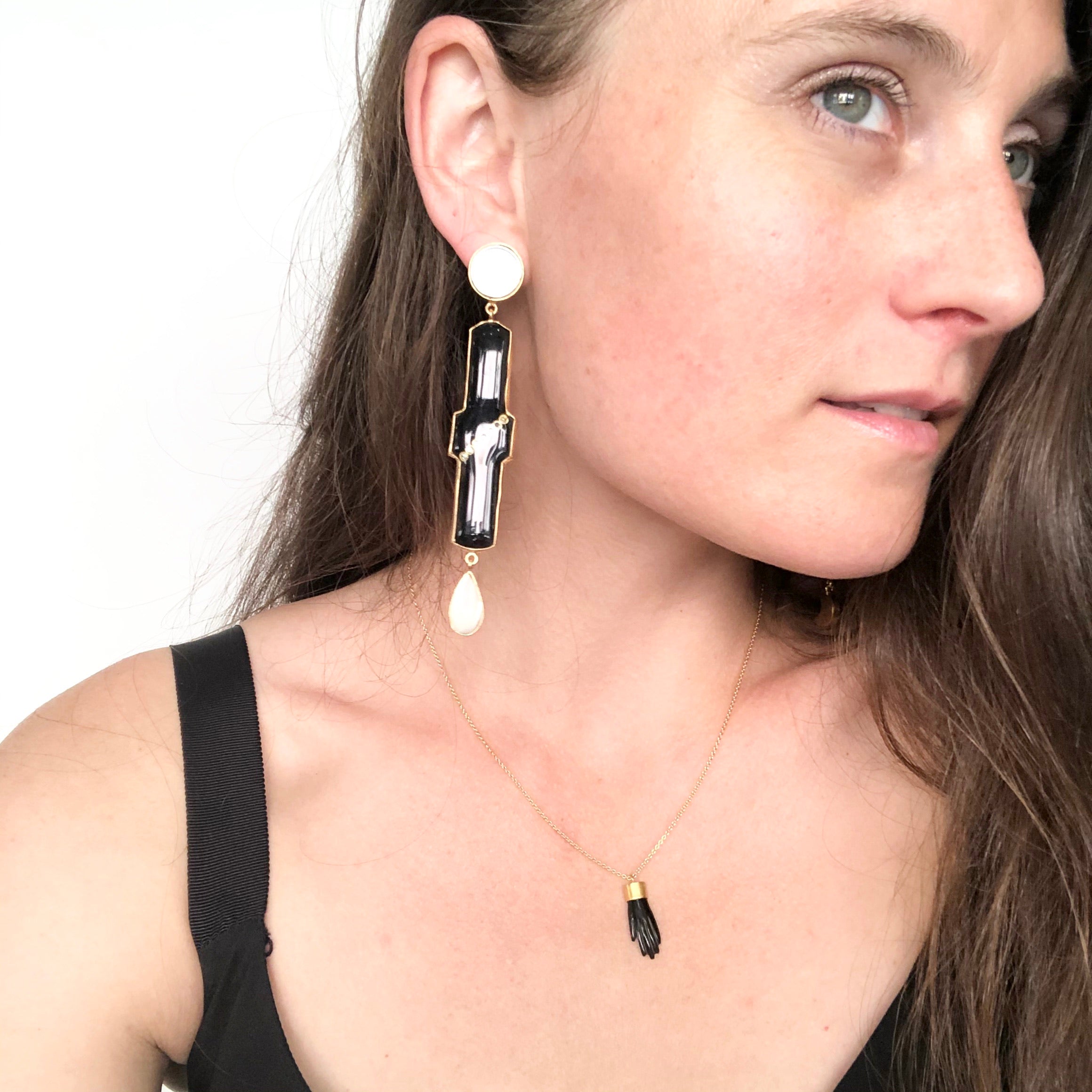 Example of black matching set of earrings for size reference