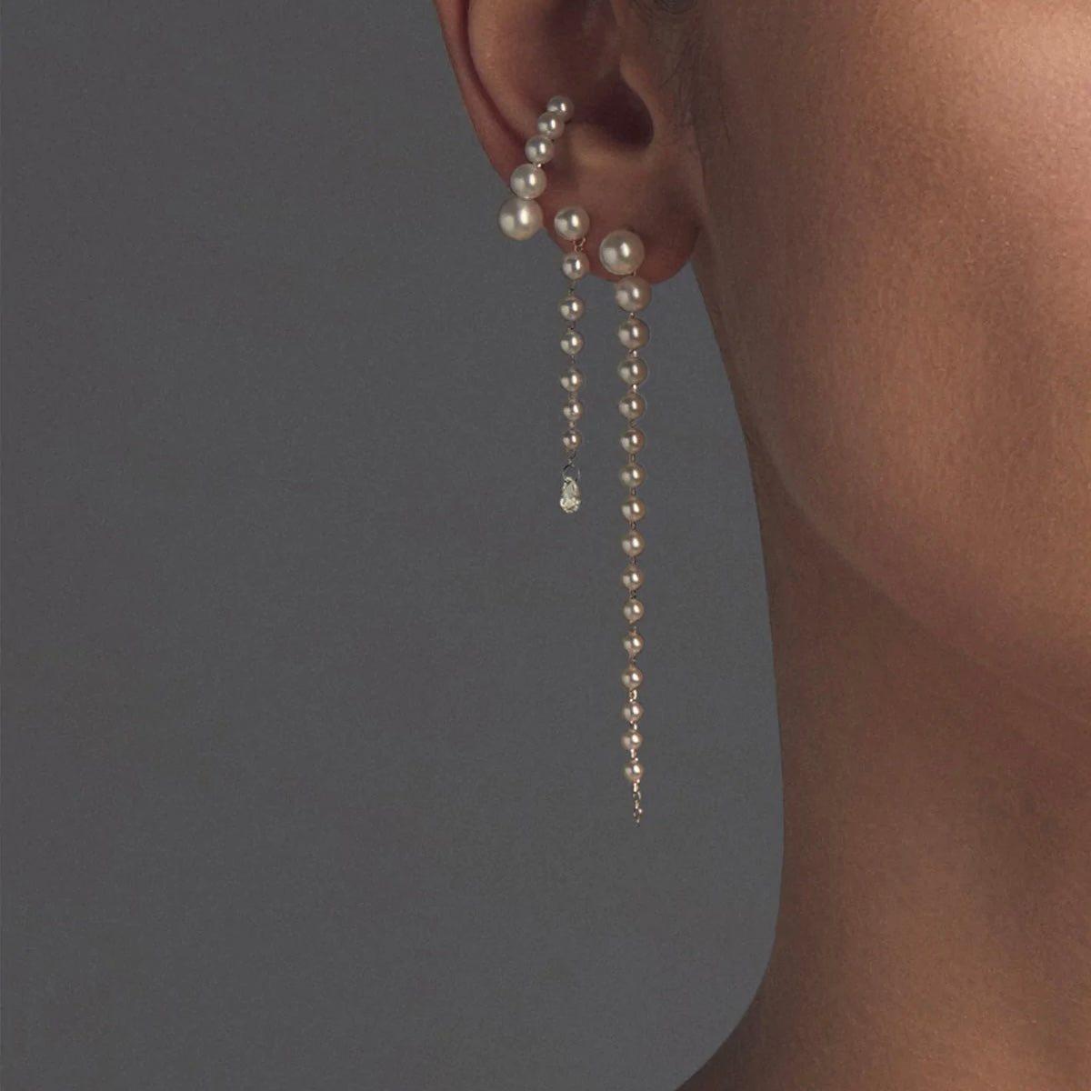 Graduated Pearl Earcuff shown worn with Cascading studs for size reference.