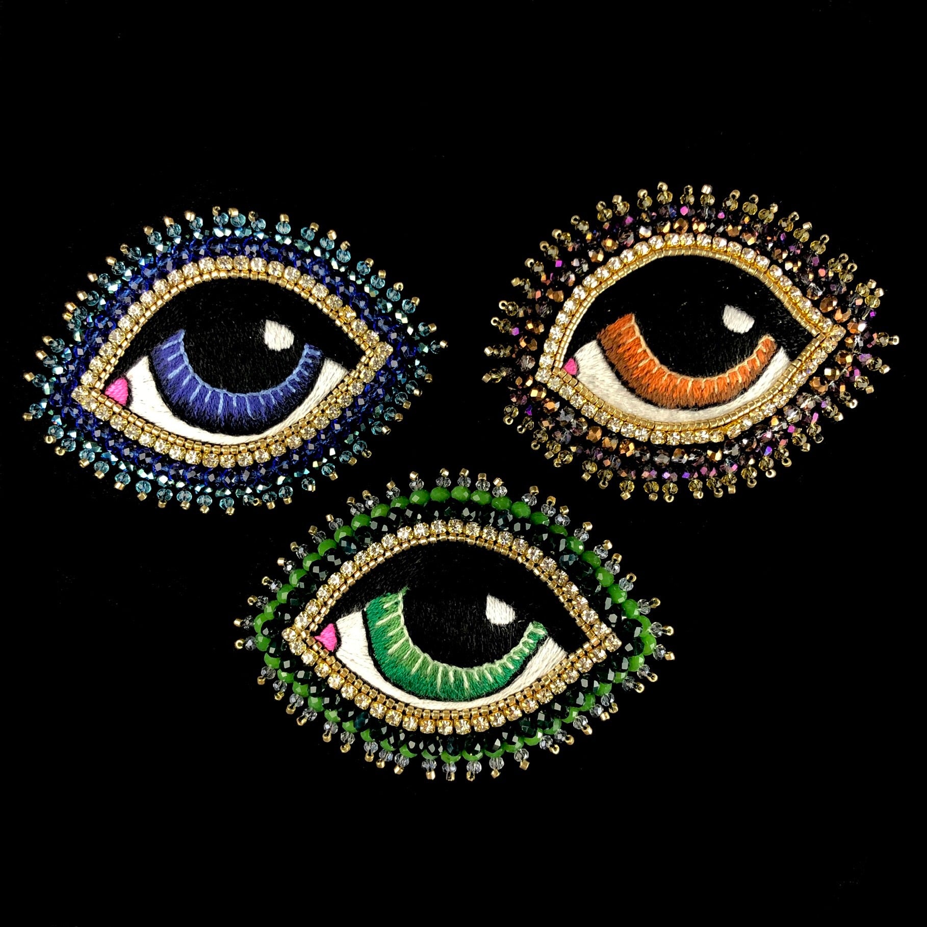 Large Blue Eye Brooch shown with green and brown options