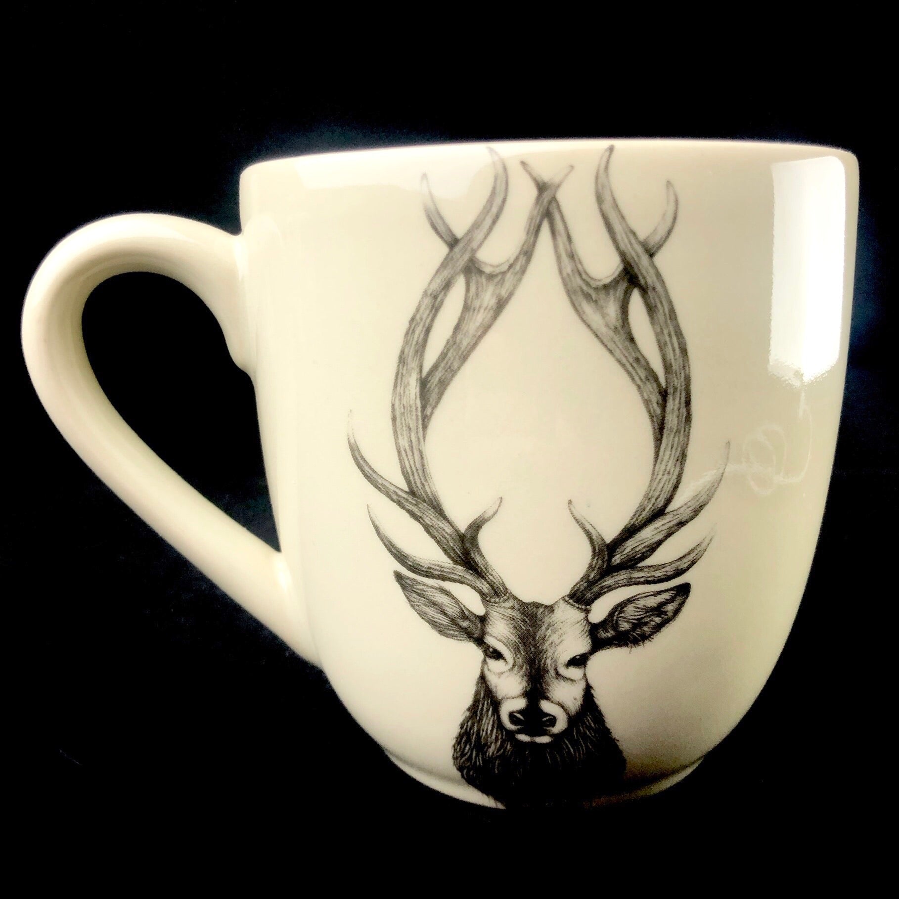 Front view of Buck Mug with brown interior