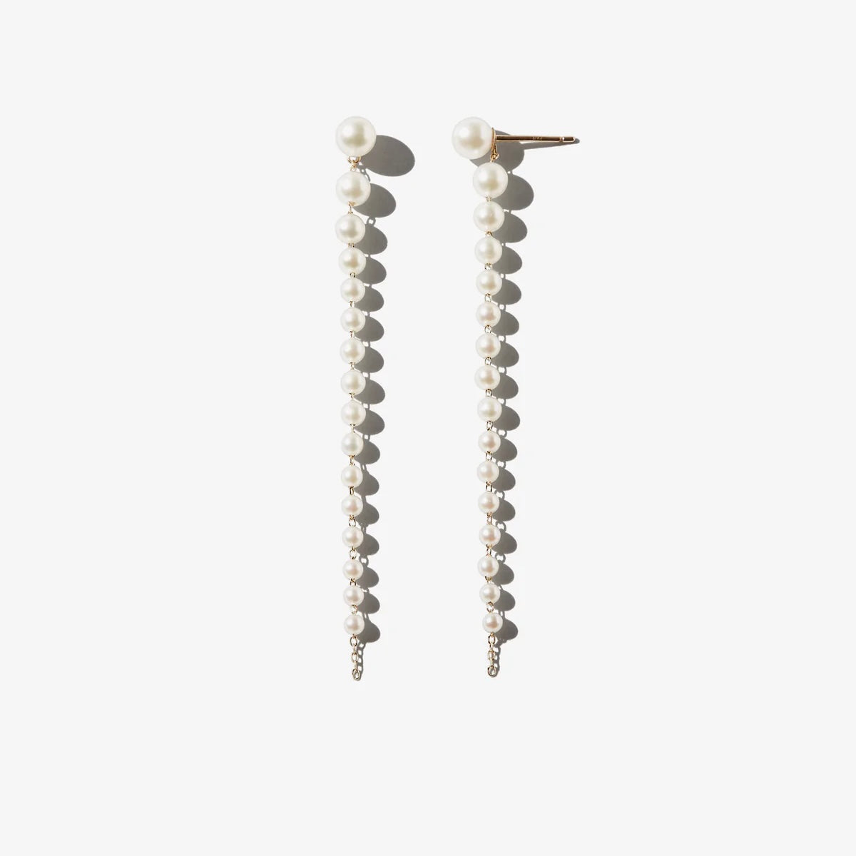 Front and side view of Cascading Pearl Earring 
