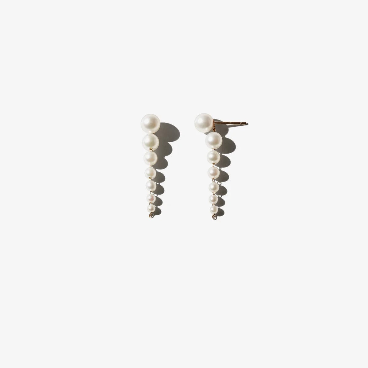 Front and side view of Short Cascading Pearl Earrings