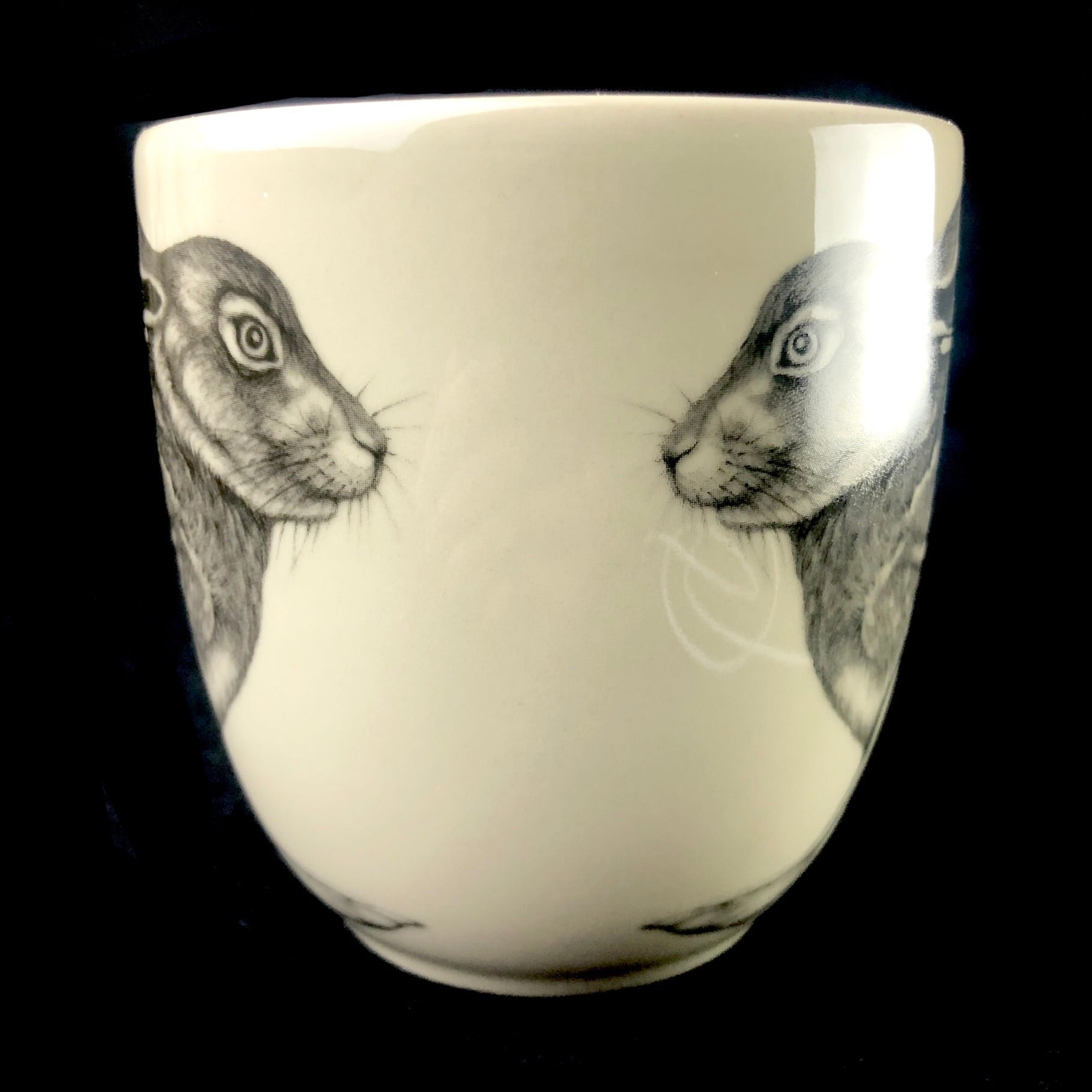Front view of Hare Mug showing drawings on both sides