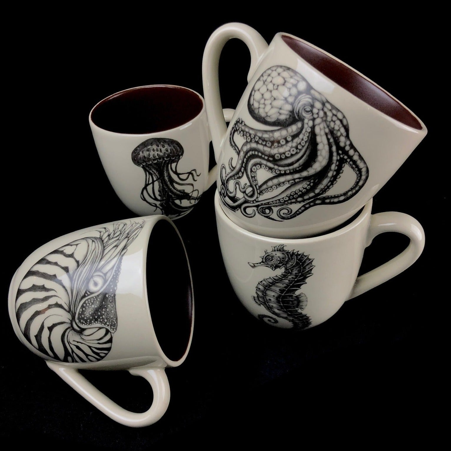 Set of four sea themed mugs including the Nautilus, Seahorse, Octopus, Jellyfish