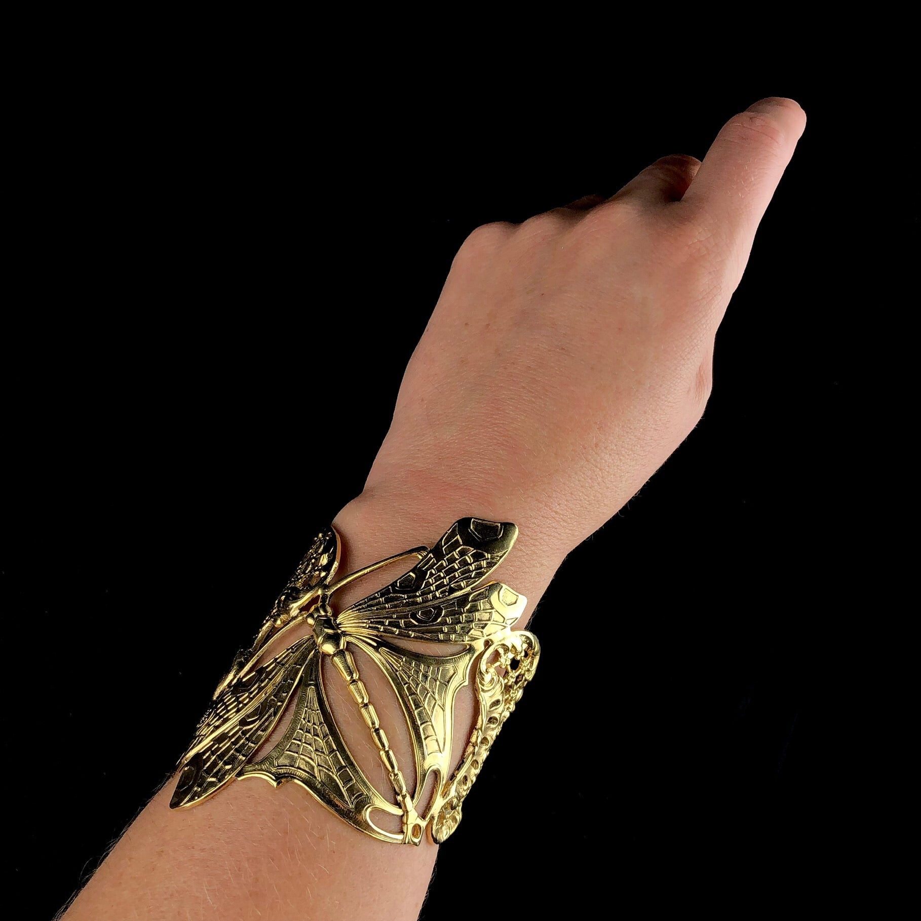 Gold Lace Dragonfly Cuff shown on wrist