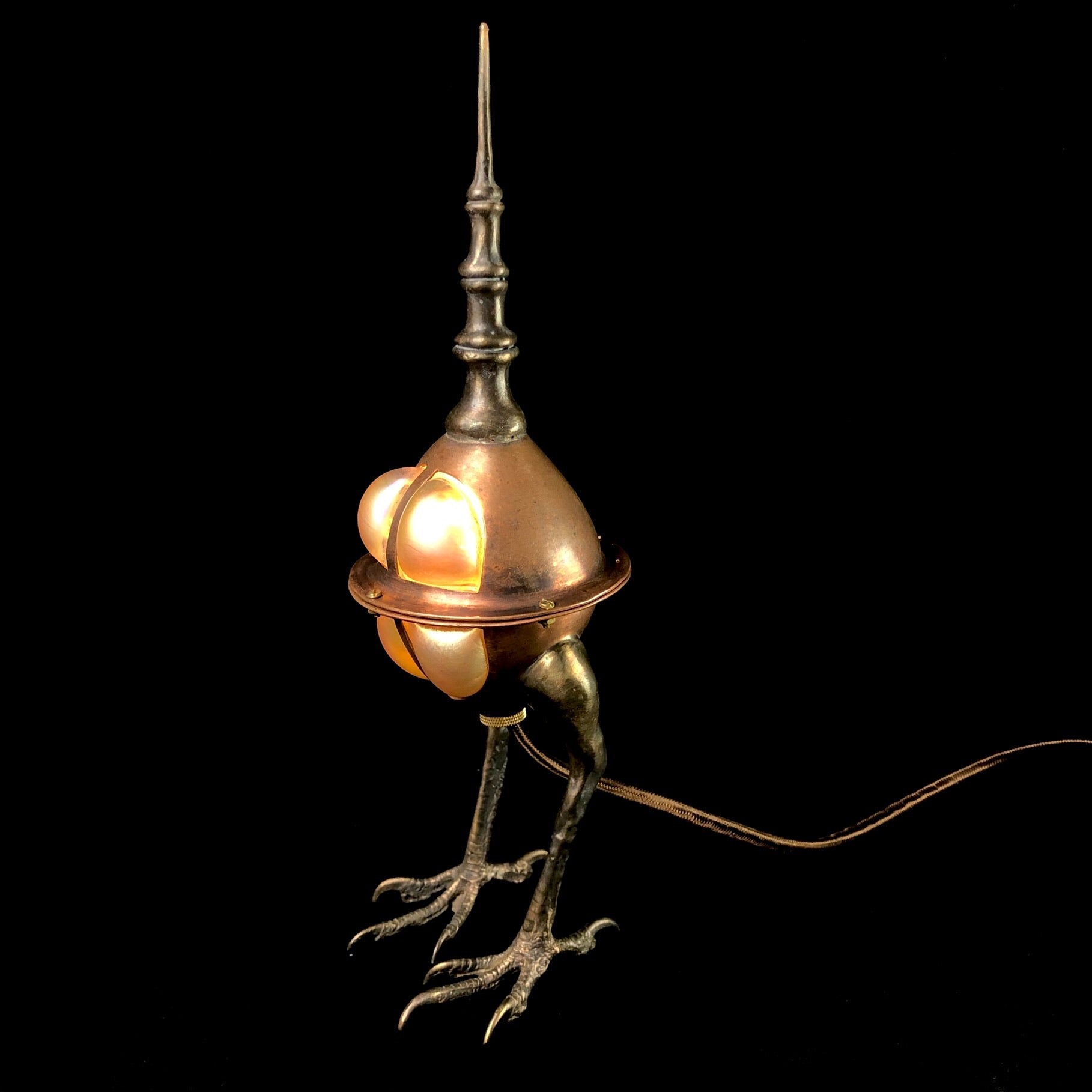 Side view of Cicada Lamp with Amber Lustre Glass
